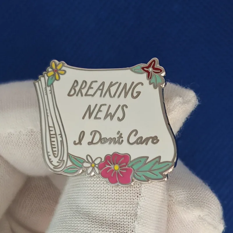 Breaking news, I don't care about newspaper brooches