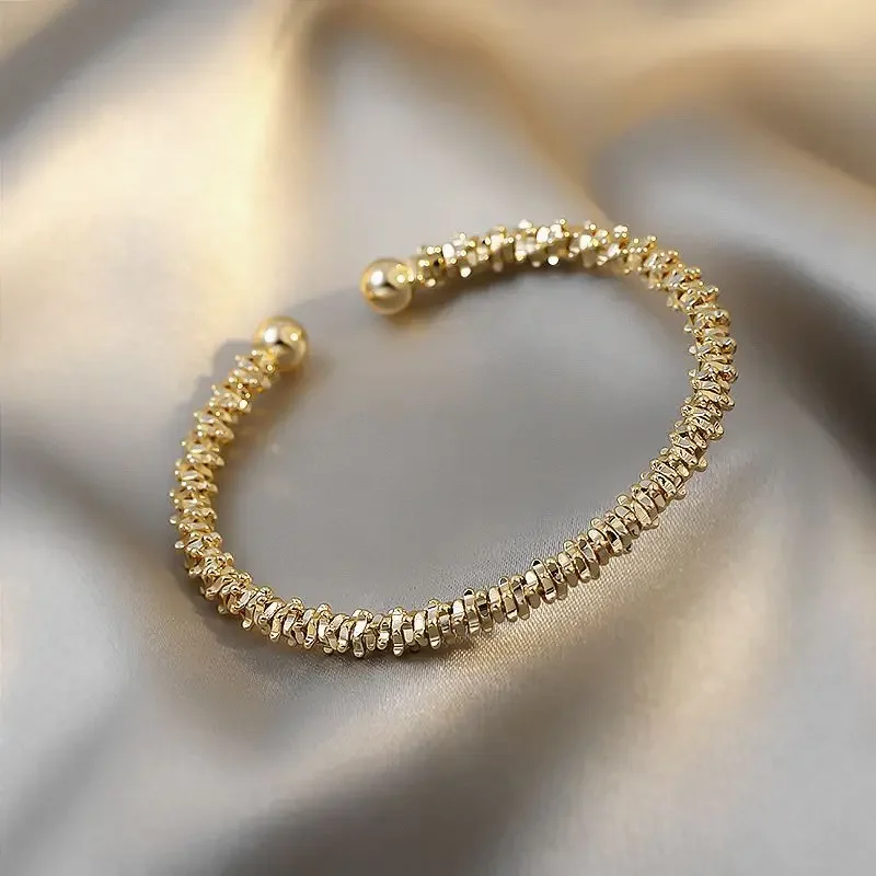 Pulsera con apertura giratoria Retro para mujer, pulsera irregular dorada, versión coreana, pulsera de viento frigid, acero inoxidable, joyería para mujer
