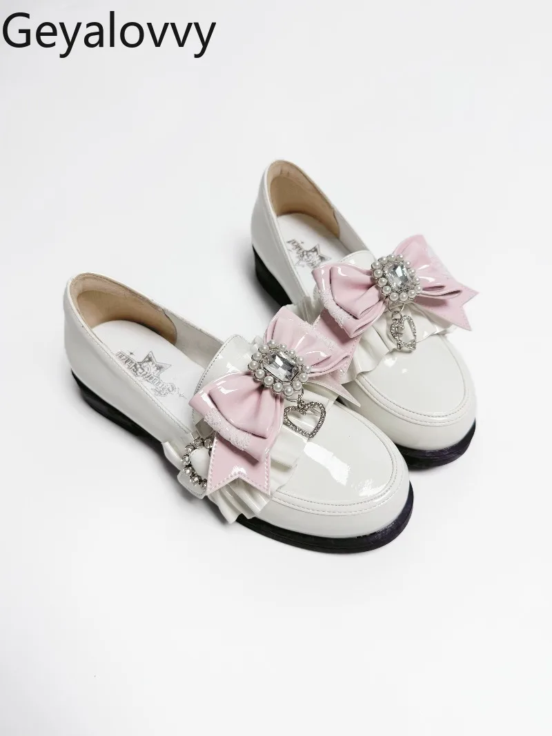 

Оригинальные универсальные милые женские лоферы в японском стиле, весенне-осенние новые однотонные кожаные туфли на низком каблуке с бантом и стразами