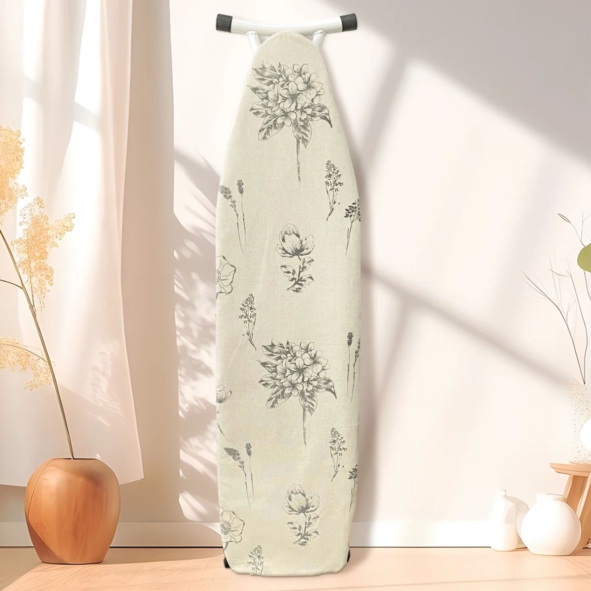 The ironing board cover is heat-resistant, made of cotton and has an extra thick iron cover. It is insulated with a drawstring a