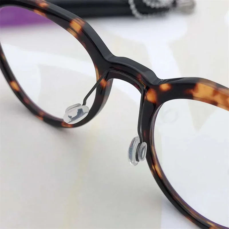 جديد بدون مسامير التيتانيوم الدنمارك النظارات 1046 خفيفة للغاية Gafas الرجال الإطار وصفة طبية نظارات نسائية قصر النظر نظارات Oculos de