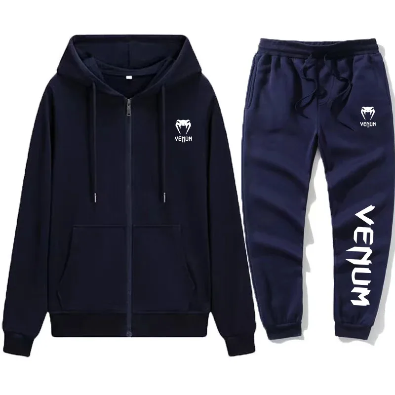 El nuevo conjunto americano para hombres de otoño e invierno es una sudadera con capucha y pantalones de chándal sueltos, informales, deportivos y para entrenamiento físico.