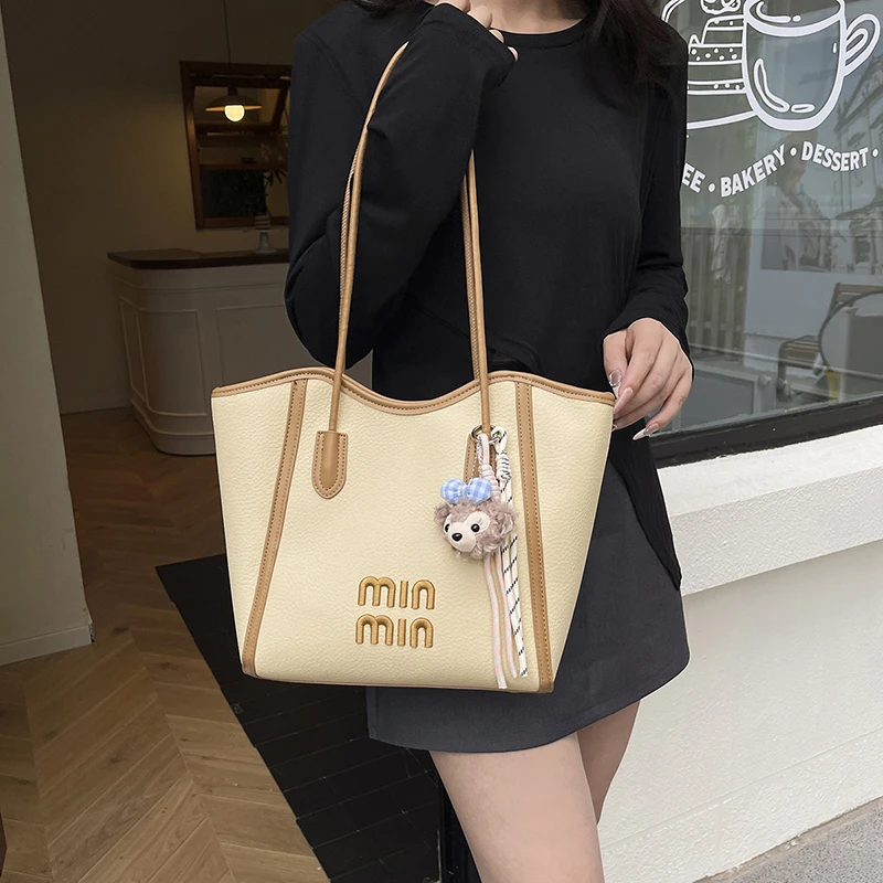 

Классическая элегантная сумка для подгузников: роскошная женская сумка-мессенджер через плечо в винтажном дизайнерском стиле с большой вместимостью.