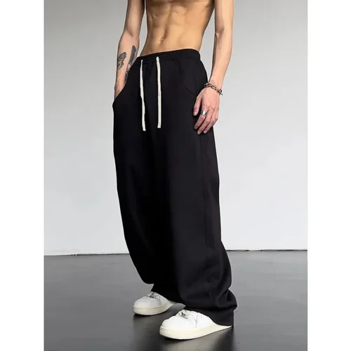 Imagen 2 del producto Pantalones deportivos con bolsillo inclinado y cintura con cordón de color sólido para hombre, pantalones sueltos informales de algodón puro, pantalones de chándal para hombre