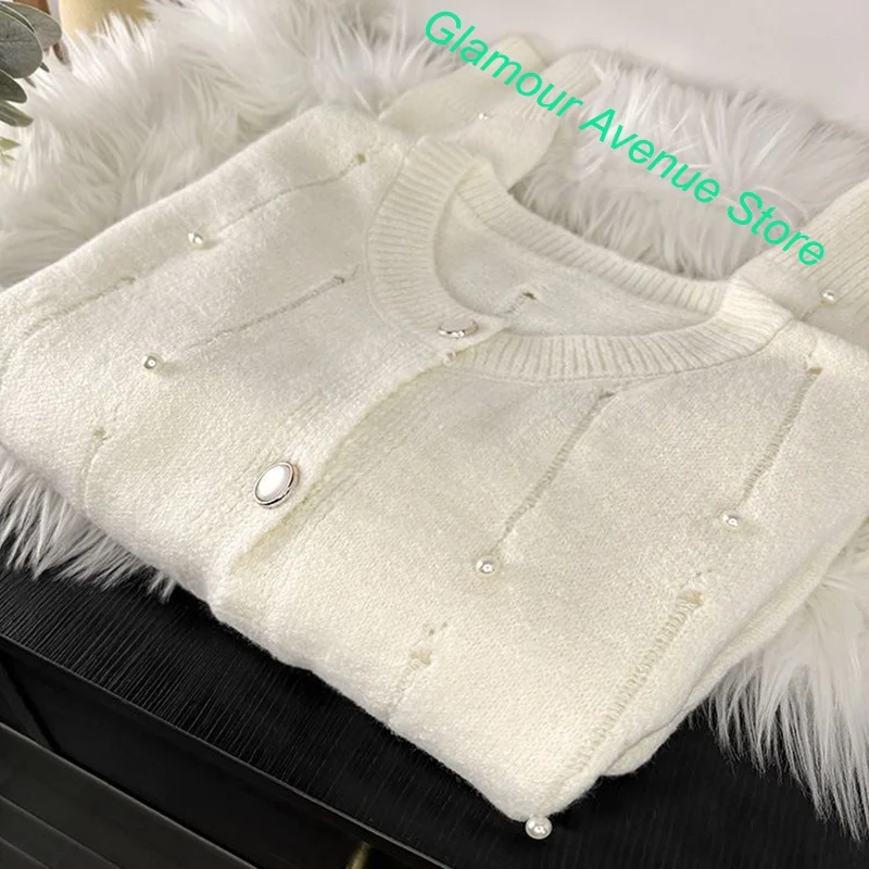 French Temperament Design Sense Hollowed-out Ladies' Knitwear Women's Autumn and Winter New Loose Fashion Heavy Beaded Tops.