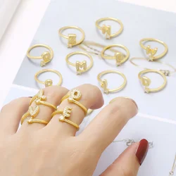 FLOLA Minimalist Crystal 26 Letters Rings for Women Gold Plated Initial Rings Adjustable Hoops Alphabet Jewelry Gifts rigs40