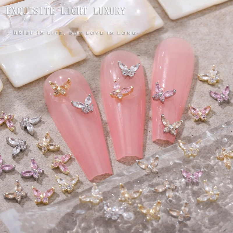 

5Pcs Sparkle Gold/Silver Nail Butterfly 5x4mm Mini Alloy Pink/White/Champagne Zircon Charms Quality Nail Art 3D Decoration