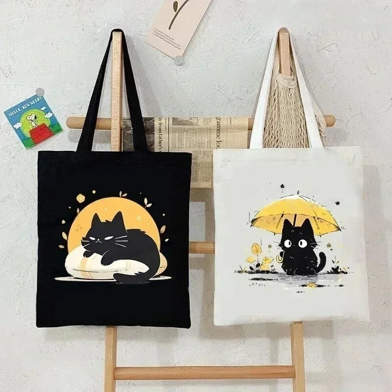 Bolso de mano de lona con diseño de gato blanco y negro Kawaii, bolso de hombro de dibujos animados de estilo japonés para mujer, bolso ecológico con temática de gatito bonito