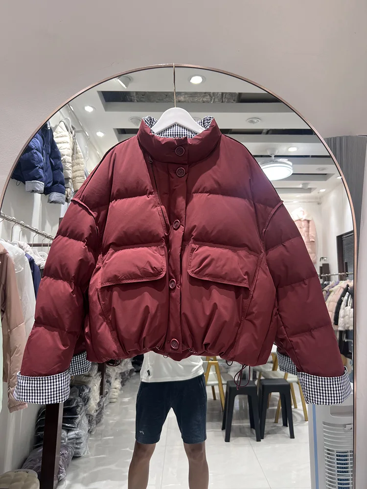 سترة شتوية جديدة على الطراز الكوري لعام 2025 بياقة واقفة وشبكة ربط واحدة الصدر عصرية غير رسمية من ريش البط الأبيض