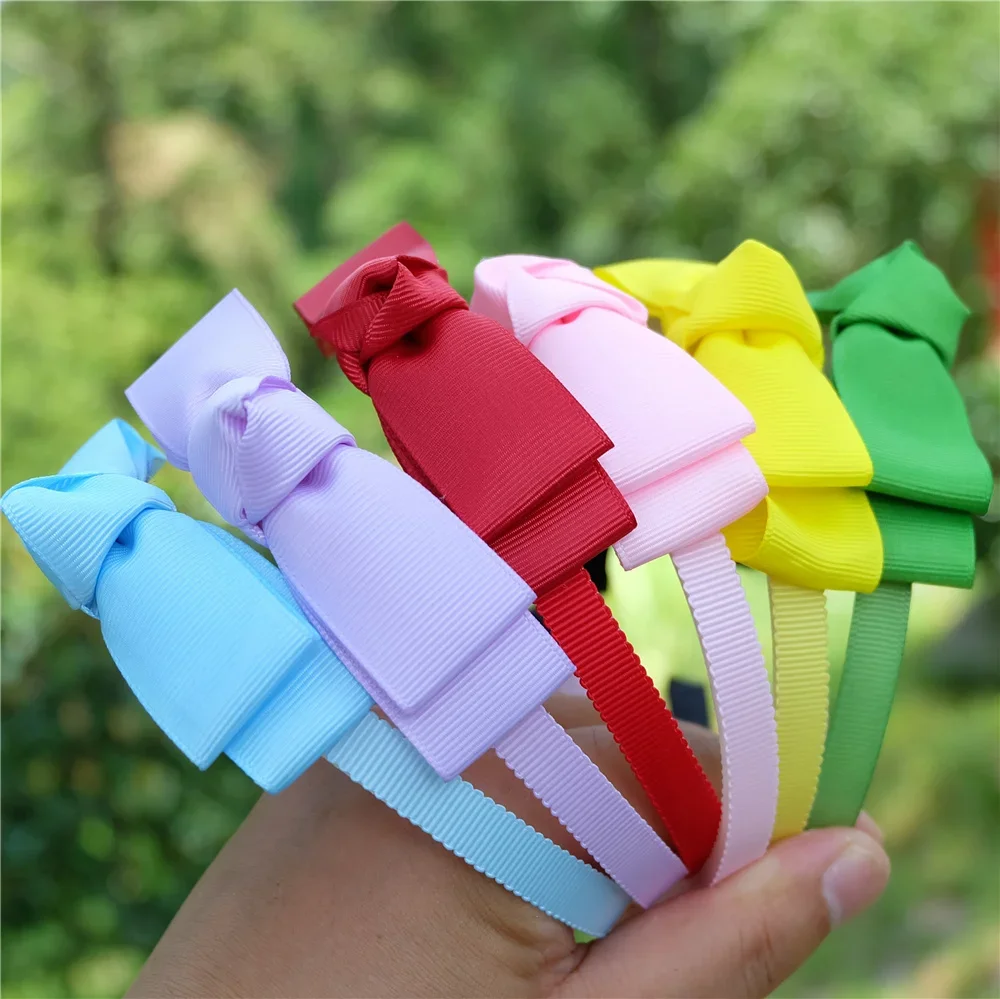 Moda dziecięca kolorowa plastikowa opaska na głowę śliczne duże kokardki opaska do włosów dziewczyny urocza opaska do włosów nakrycia głowy prezenty dla dzieci akcesoria do włosów