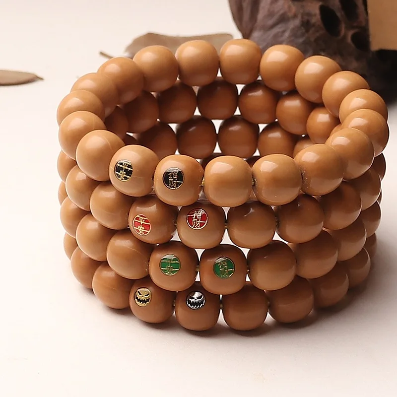 

Monkey Peach Core Extreme Old Type Inlaid Gold Label Bracelet Walnut Peace And Wealth