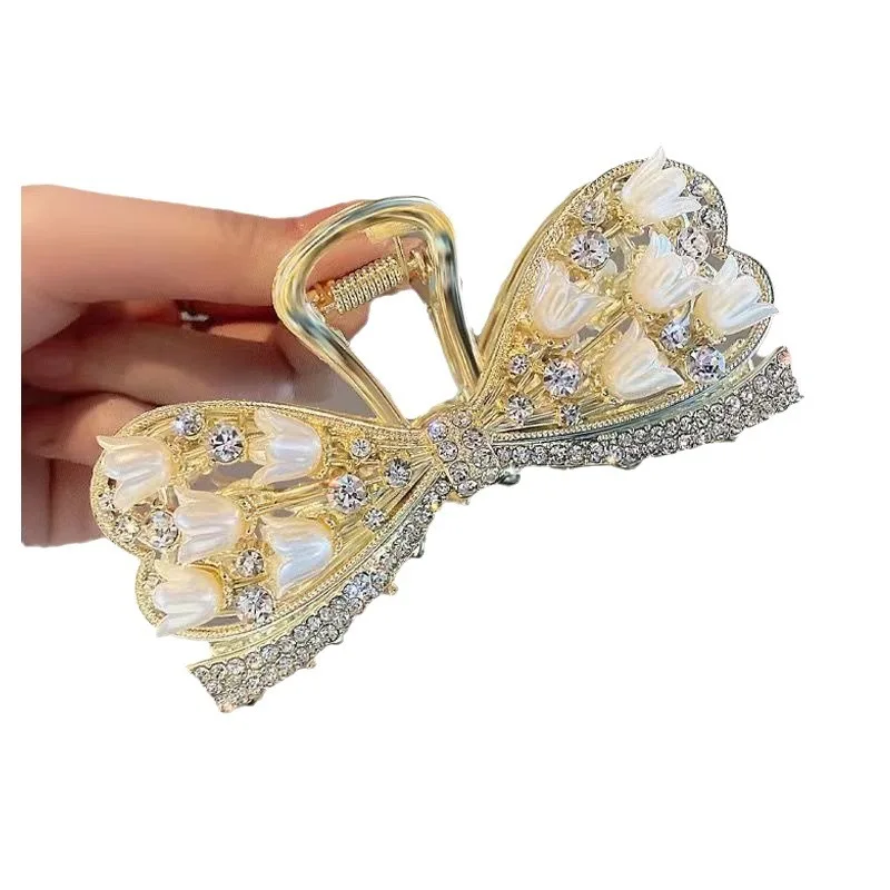 مشبك شعر بأحجار الراين واللؤلؤ المعدني والشرابات والكعكة وسبايك القمح ومشبك القرش