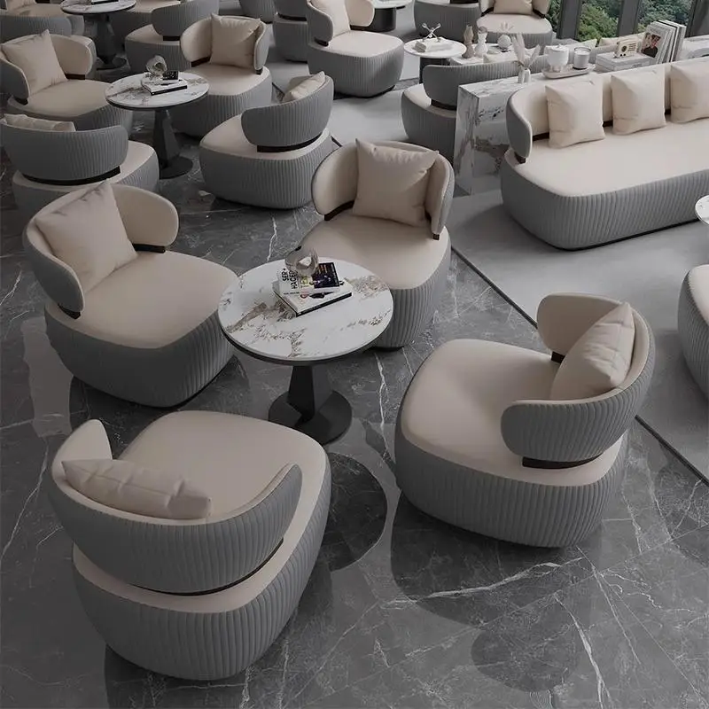 Sales office reception and negotiation lounge area sofa chairs office business reception guests one table and four chairs