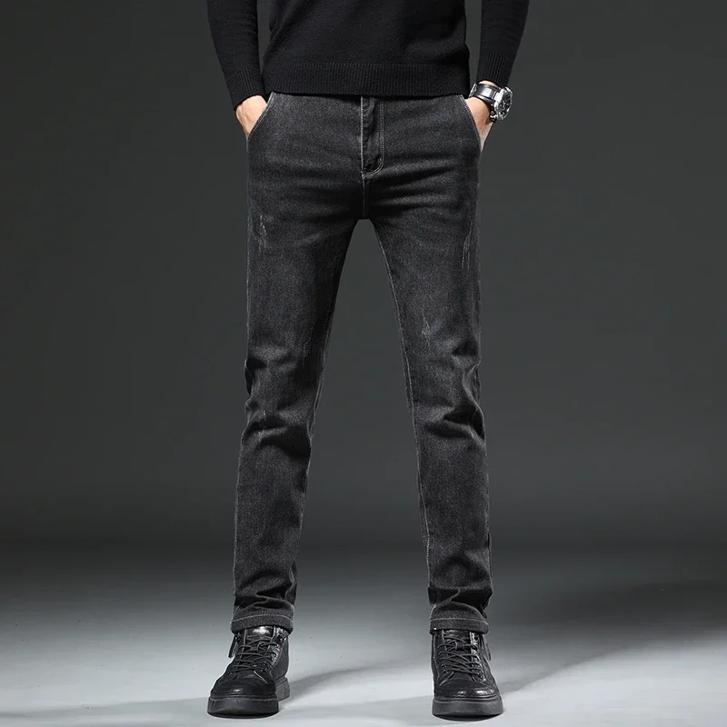 秋と冬の新作伸縮性のあるルーズフィットペンシルパンツファッションブランドデニムメンズジーンズカジュアルハーランパンツ
