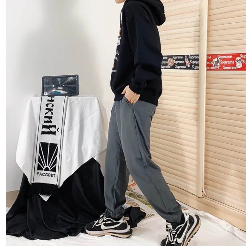 2024 new trend brand fashion casual pants spring and autumn new loose bundle feet sports nine-minute men's pants