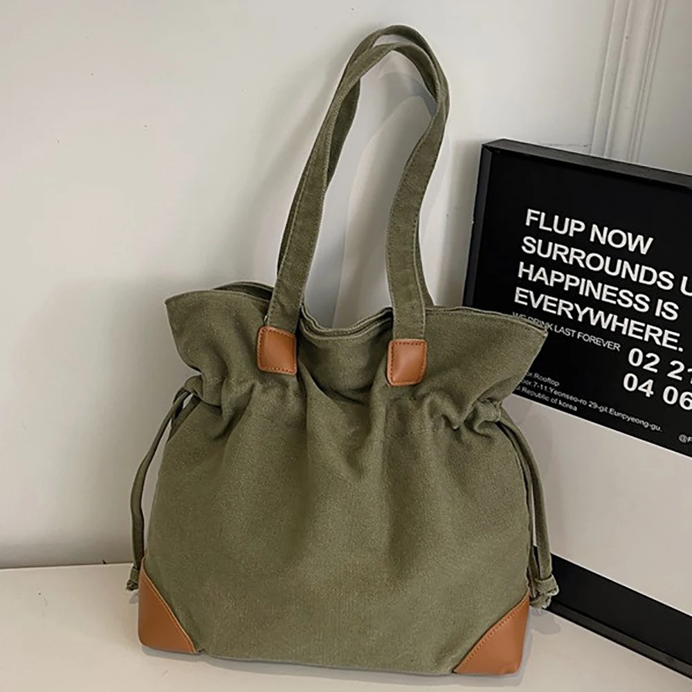

2025 New Large Capacity Canvas One Shoulder Bag for Women Casual All-Match Zipper Drawstring Bucket Bags Commute Underarm Packs