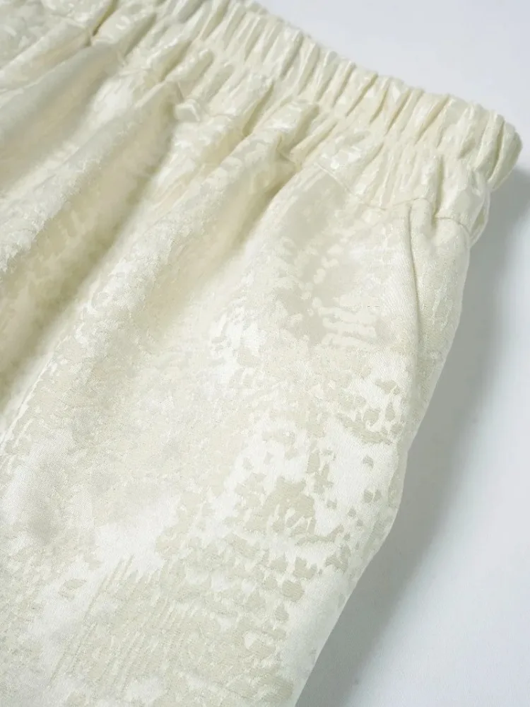 Damskie spodnie z elastyczną talią, uniwersalne, codzienne, do kolan, wykonane z 35% naturalnego jedwabiu morwowego i 65% wełny, w jednolitym kolorze.