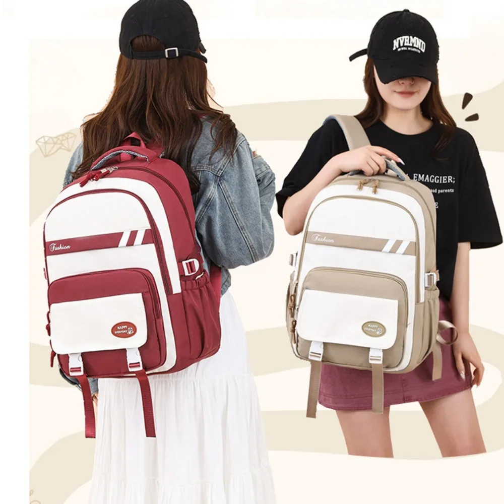 กันน้ําเด็กโรงเรียนกระเป๋าเป้สะพายหลังไนลอนความจุขนาดใหญ่นักเรียนกระเป๋านักเรียนน้ําหนักเบากระเป๋าเป้สะพายหลังโรงเรียนประถมศึกษาชายหญิง