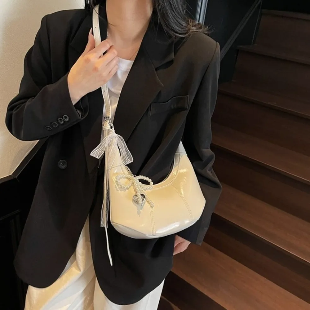 

PU Leather Korean PU Crossbody Bag with Pendant Bow Love Heart Korean Underarm Bag Dumpling Bag Solid Color Women Shoulder Bag