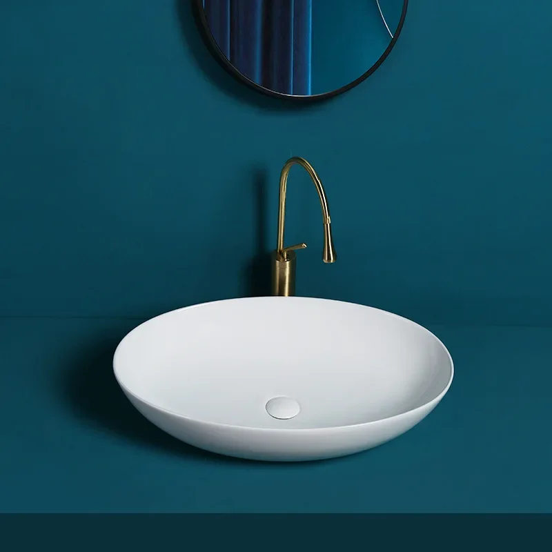 Nordic light luxury ceramic countertop basin oval hotel household wash basin balcony