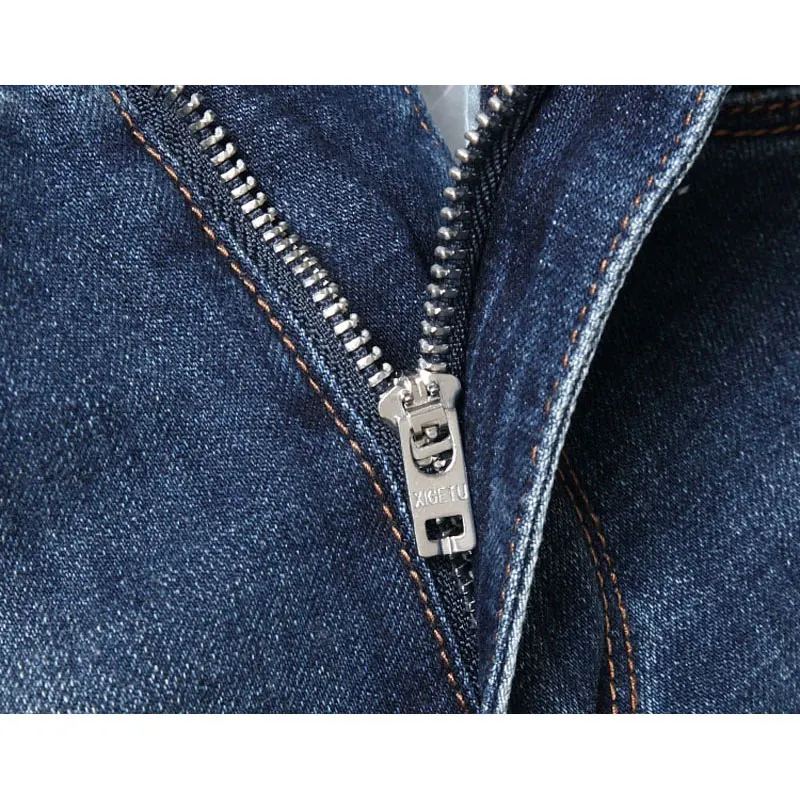 Jeans da uomo streetwear alla moda, jeans patchwork di mucca spaccati elasticizzati blu lavati retrò di alta qualità, re da uomo firmato