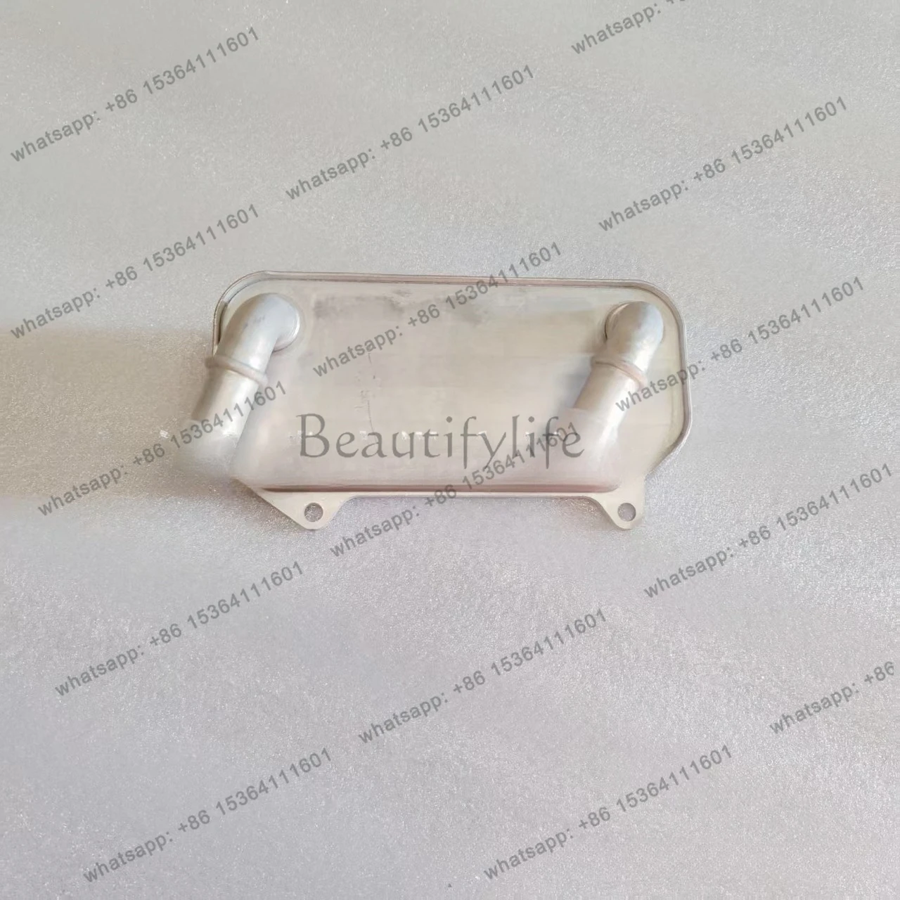 

1726101DT000 Automotive engines, oil coolers