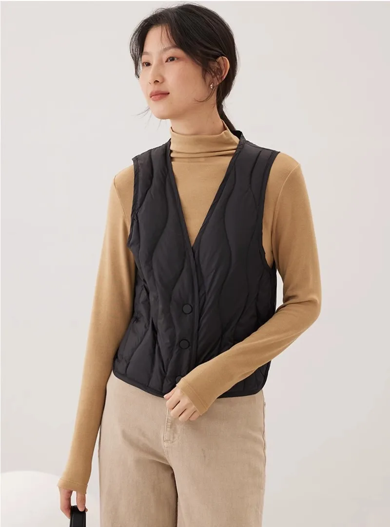 Schinteon เสื้อกั๊กขนเป็ดสีขาวน้ำหนักเบามากสำหรับผู้หญิงแจ็คเก็ตแขนกุดคอวีคอปกเสื้อซับในแฟชั่นฤดูใบไม้ร่วงฤดูหนาว2023ใหม่