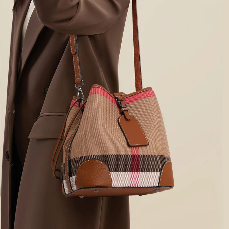 Vintage Checkered Bucket Bag with Pebbled Leather Trim & Tag AccentTimeless Plaid Canvas Handbag  Spacious Design for Everyday