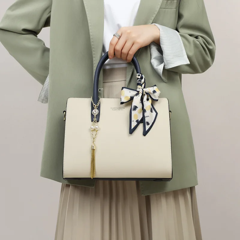 

Women's new work handbag, niche genuine leather, high-end texture, large capacity crossbody bag