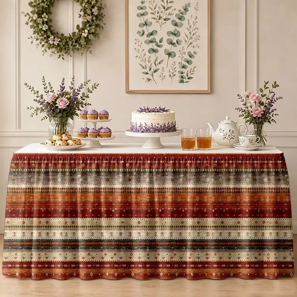 One table skirt with a striped pattern and geometric dot details, featuring ruffled edges on the table skirt.