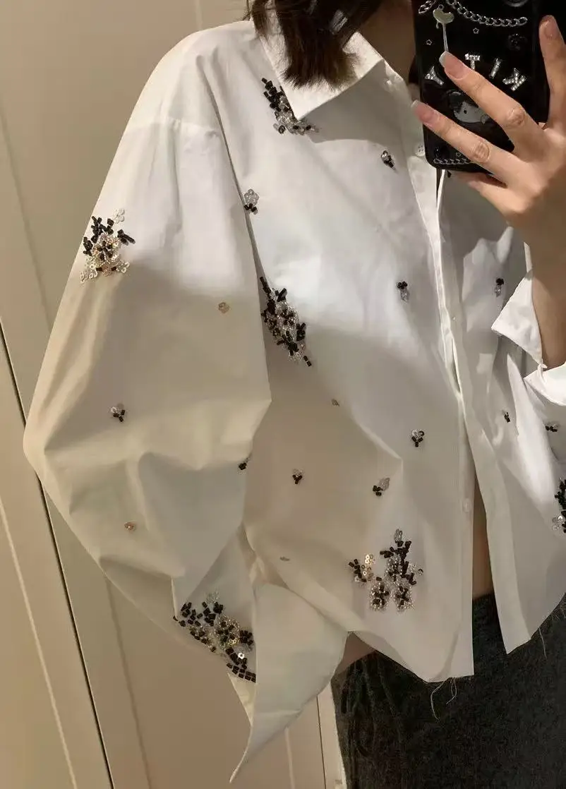 

Роскошный дизайн, хлопковые белые, черные блузки с вышивкой и блестками, рубашки для женщин, осенний тренд 202, свободный короткий топ с длинными рукавами