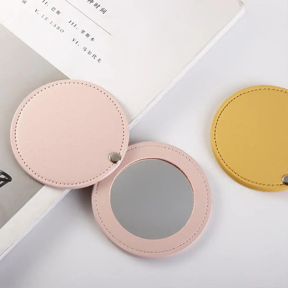 Miroir de maquillage rotatif en cuir PU pour femmes et filles, miroir de poche compact, ultra-fin, accessoires de voyage, cosmétique, cadeau pour elle