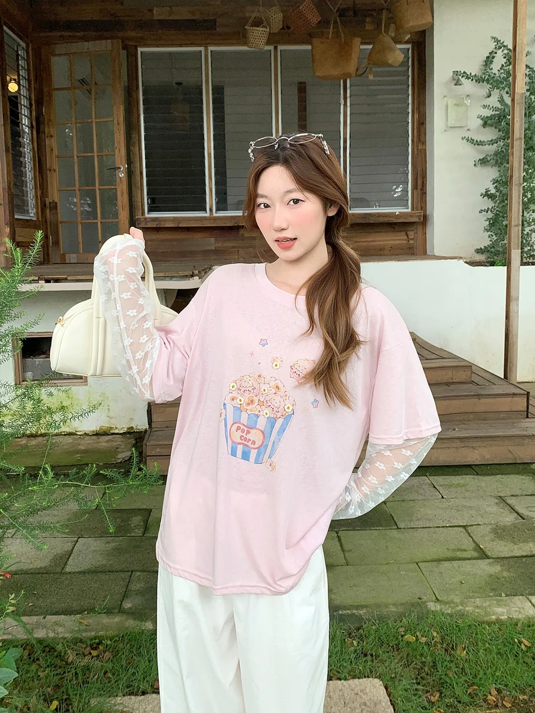 Camisa de manga larga con encaje estilo dulce y picante, protección UV, ropa de verano para mujer, nueva ropa de playa para exteriores, top con estampado de palomitas de maíz