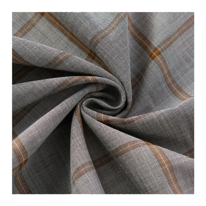 De stof voor modieuze heren- en damescasual pakken, werkkleding, rokken, broeken