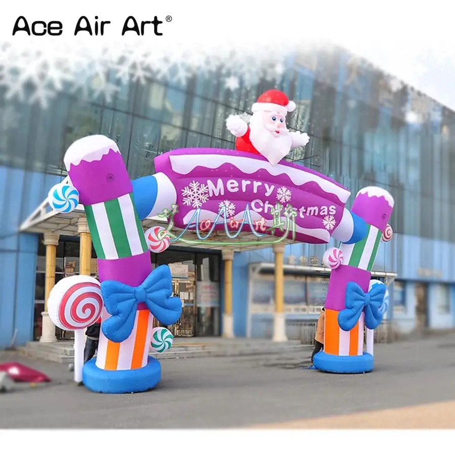 Aangepaste opblaasbare boog met snoep en kerstman Merry Christmas boog voor festivaldecoratie gemaakt in China