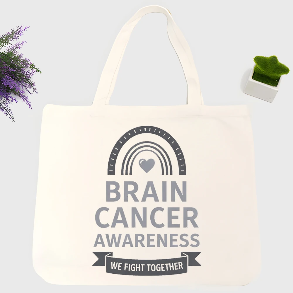 Men's brain cancer awareness graphic canvas tote bag with rainbow and heart design, suitable for daily use and casual outings