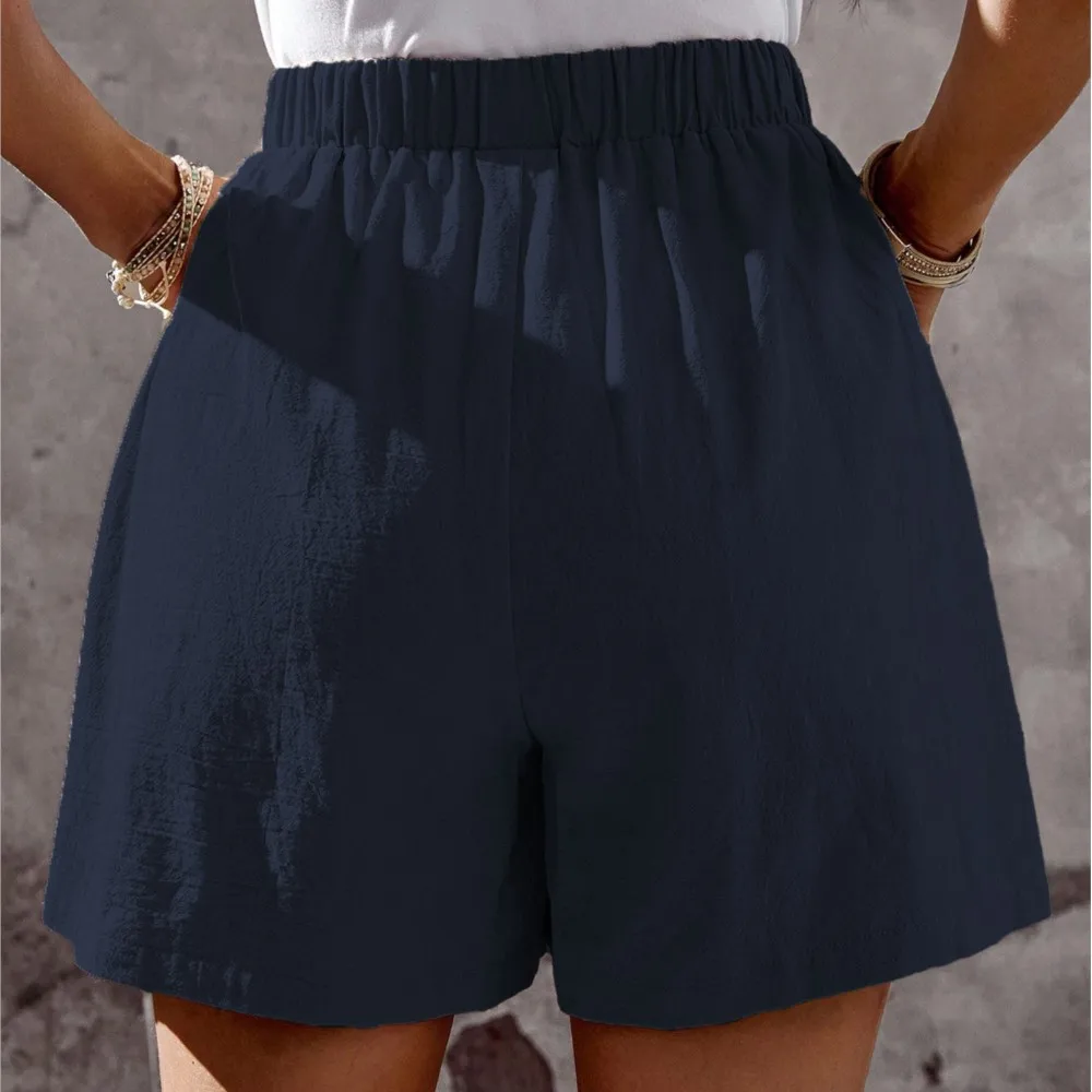 2025 novo estilo de verão feminino casual solto shorts bolso viajando all-match estilo simples quente na moda botão cor sólida moda