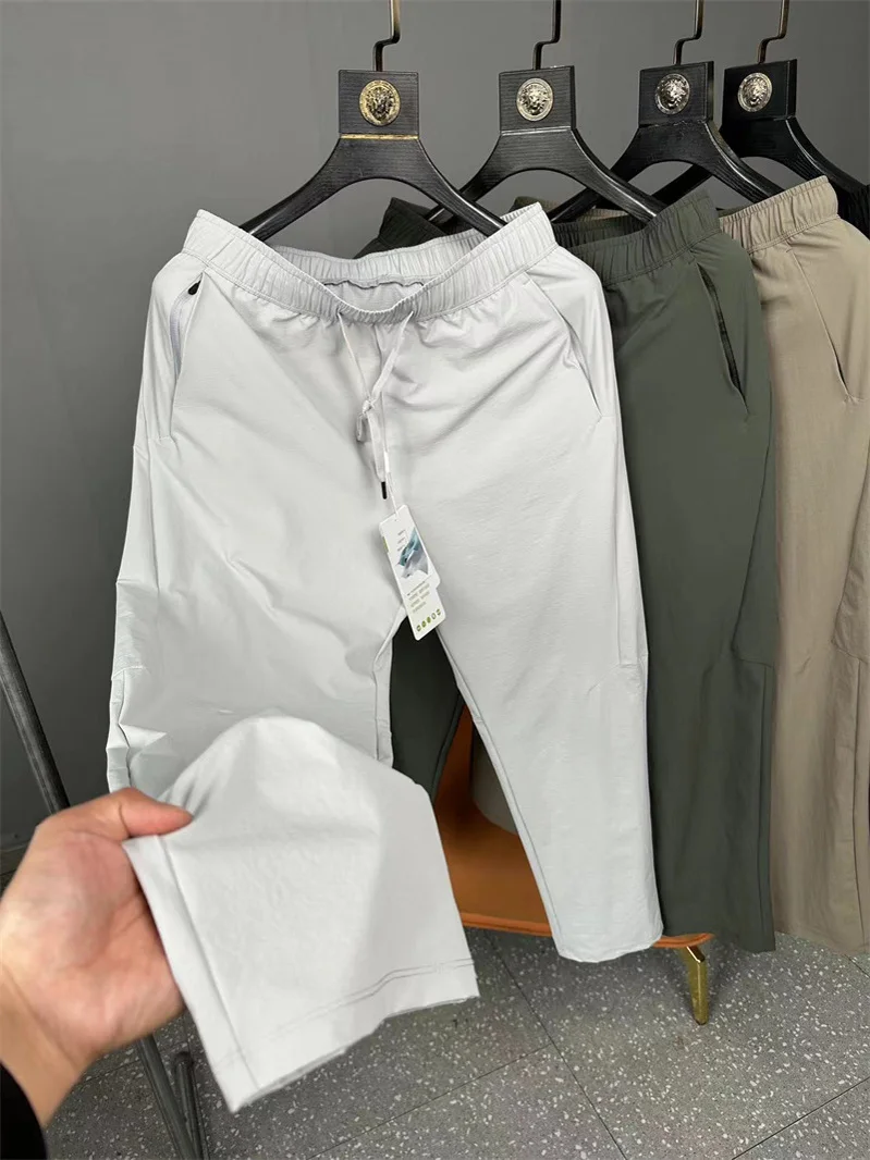 

Lightweight Breathable Laser Perforated Cotton Feel Qui Dry Summer Men's Spor Casual Long Pants Straight Leg Fit