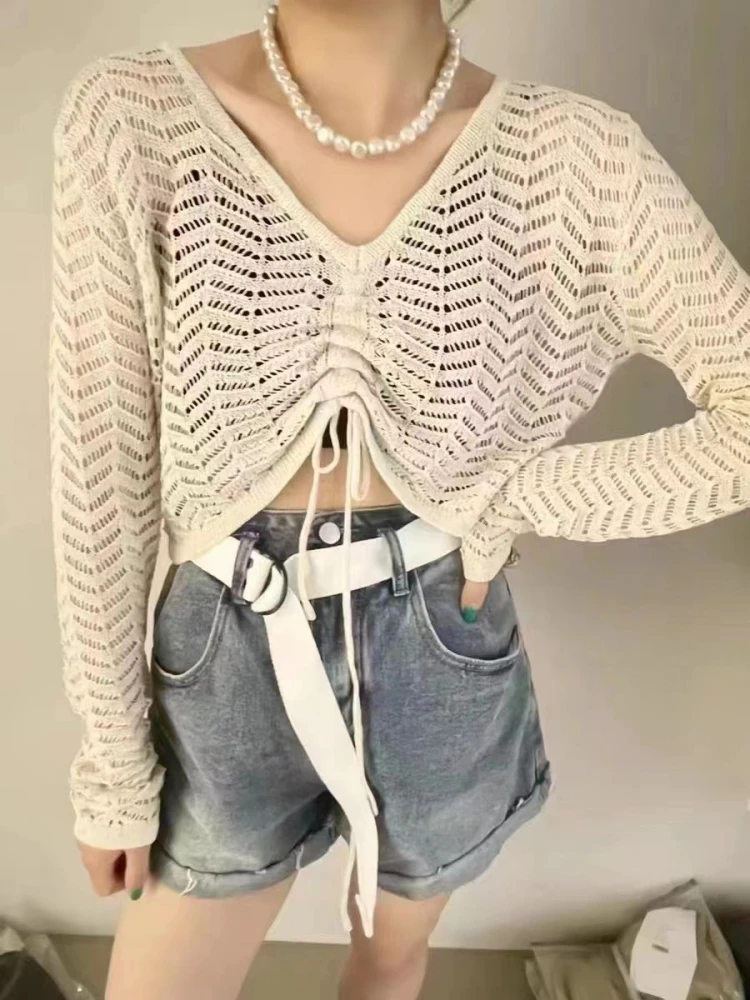 

Premium Sweet And Spicy V-Ne Dstring ort Svel Knitted Top Women's Spring New Hollow out Design Long Sve Blouse