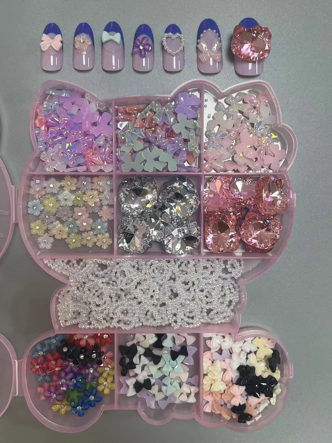 

Beauty Salon 360PCS Mixed Bow Knot Rhinestone Resin Flower Hollow Pearl Heart Butterfly Nail Art Gem Charm Pink Kitty Box Set