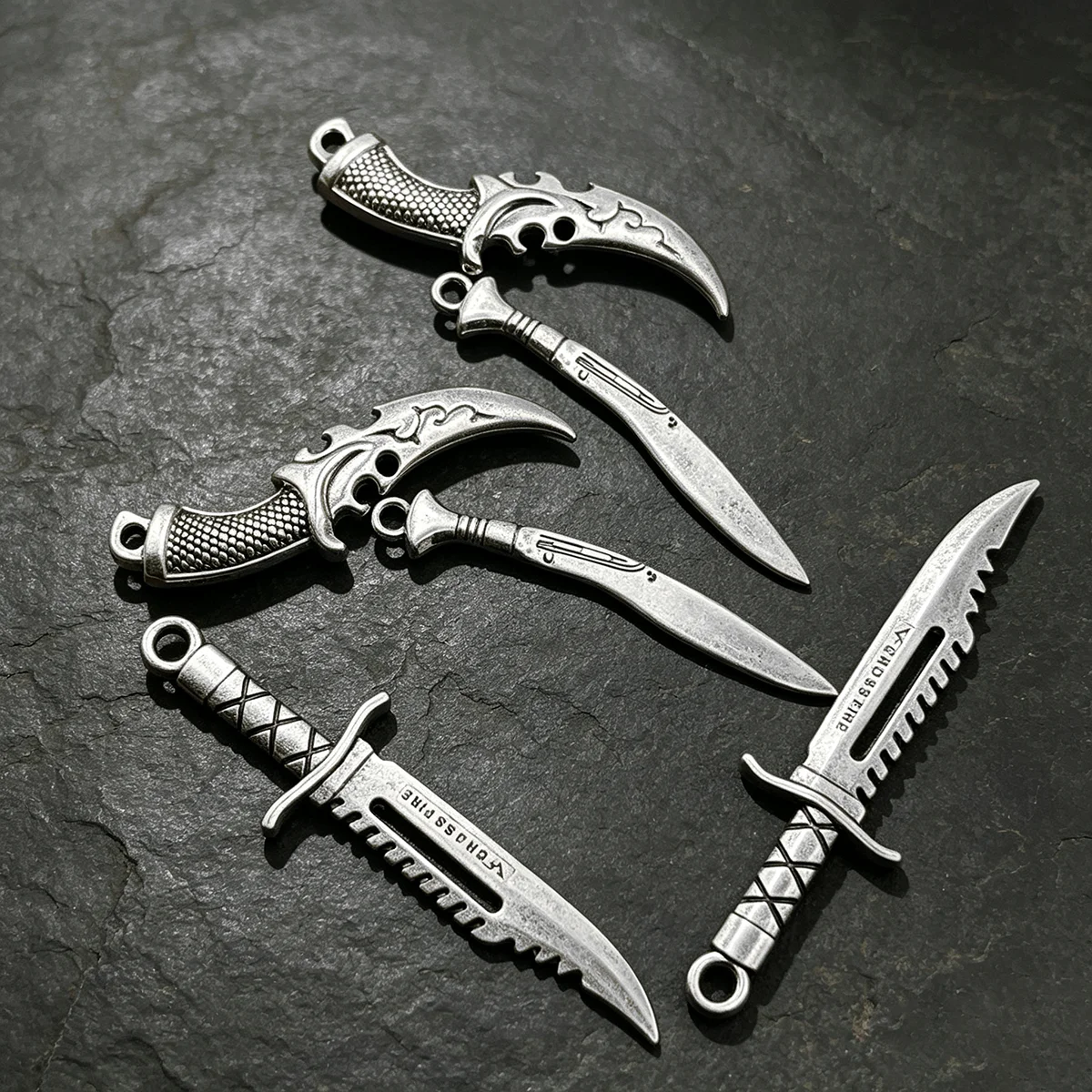 6-Piece Set of Tactical DIY Handmade Accessories, Featuring Serrated Tactical Daggers, Simple Styles, and Curved Blades with Patterned Grips in Three Designs, Suitable for DIY Bracelets, Necklaces, Earrings, Pendants, and Handmade Beaded Decoration Accessories