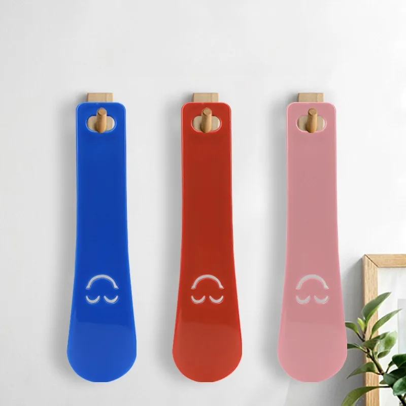 1/2 قطعة 15 سنتيمتر سهلة الاستخدام مقبض بلاستيكي الأحذية القرن قطعة أثرية سحب ضخ الأحذية المهنية النساء الرجال حذاء القرن الأحذية ملعقة