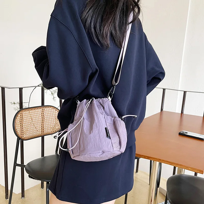 

2025 Nylon Casual Messenger Bag for Women, Fashionable Drawstring and Buckle Bucket Bag, Perfect for Outdoor Use and Versatile