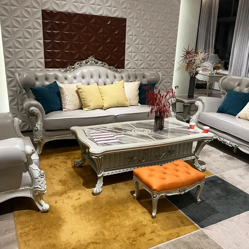 

Европейский кожаный диван из цельного дерева, французская маленькая квартира, гостиная, элитный роскошный европейский и американский кожаный диван.