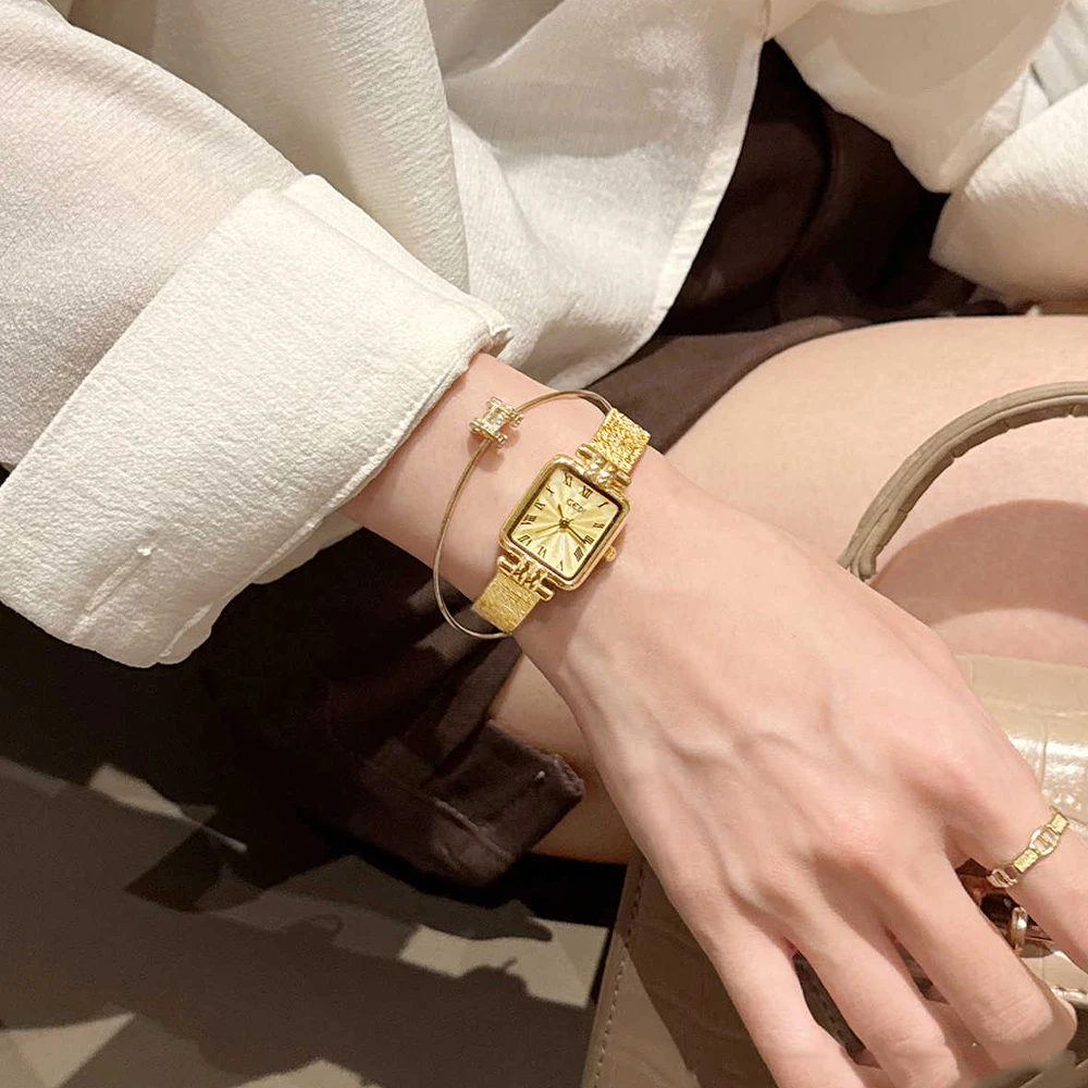 ساعة كوارتز من الفولاذ المقاوم للصدأ باللون الذهبي من GEDI هدية ساعات يد نسائية فاخرة وأنيقة