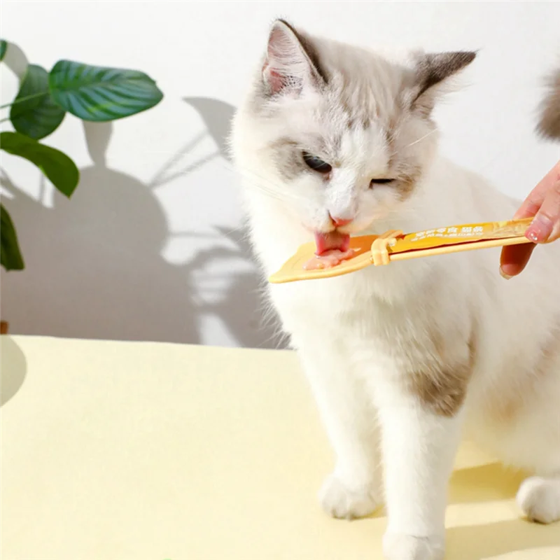 ABJO-Cat Snack Alimenti liquidi Strumenti per spremere Alimenti bagnati Trattare Cucciolo Gattino Dispenser Cucchiaio multifunzionale per alimentazione gatti Arancione