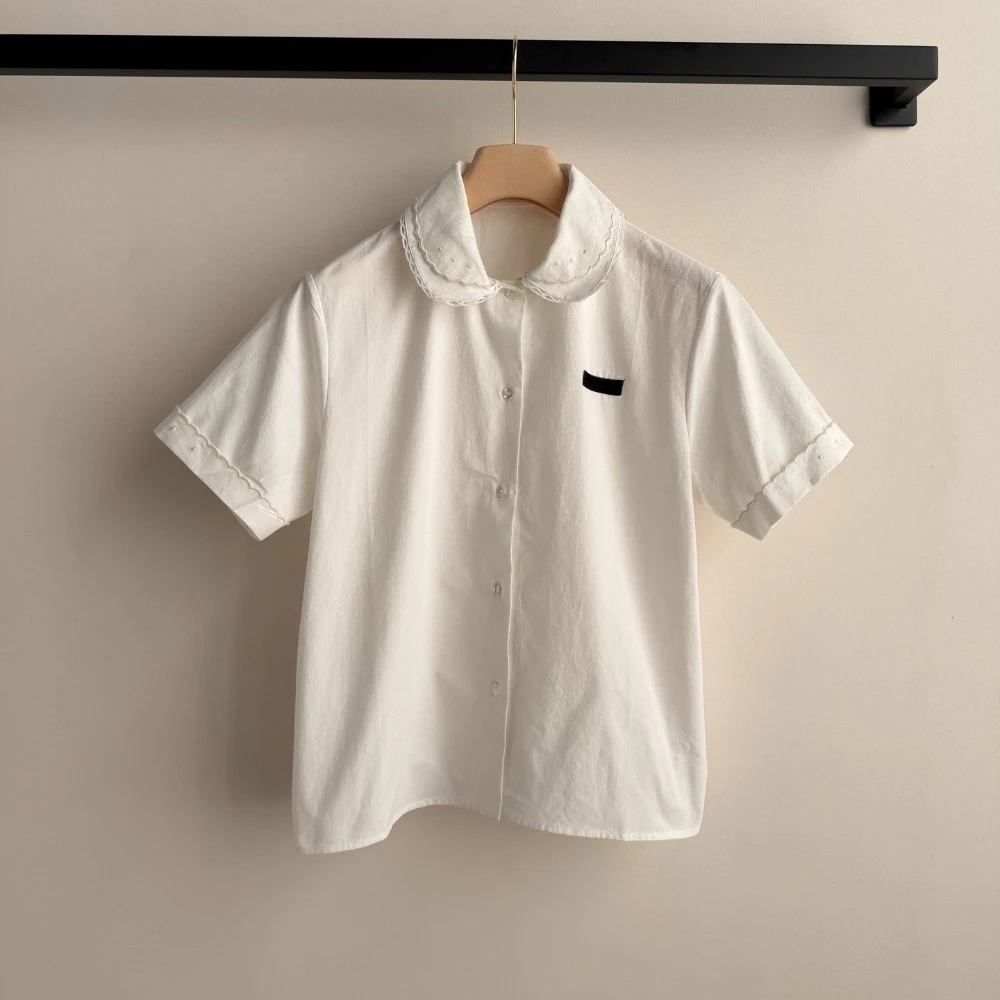 

Новые женские поло-рубашки 2026 года: элегантный интеллектуальный стиль, короткий рукав, для офиса и повседневной носки, мягкий и удобный топ