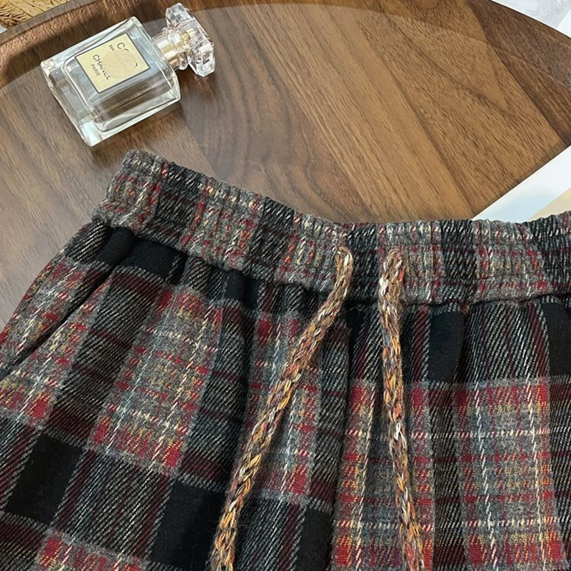 Szerokie spodnie w kratę damskie jesienno-zimowe grube w stylu preppy casual proste spodnie damskie słodkie sznurowane z wysokim stanem luźne ciepłe spodnie