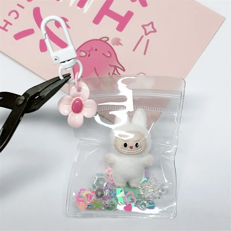 New Mini Kawaii Labubu Girl Keychain Crushed Stone Vinyl Cute Cereal Baby Walking Bag Mobile Pendant Cute Keychain