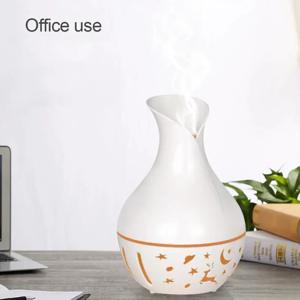 Mini USB Umidificatore Diffusore di aromi 200ml Nebbia fredda ad ultrasuoni 7 colori LED Olio essenziale incluso